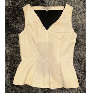 VERY GENTLY USED Rober Rodriguez 100% Leather Peplum Top.